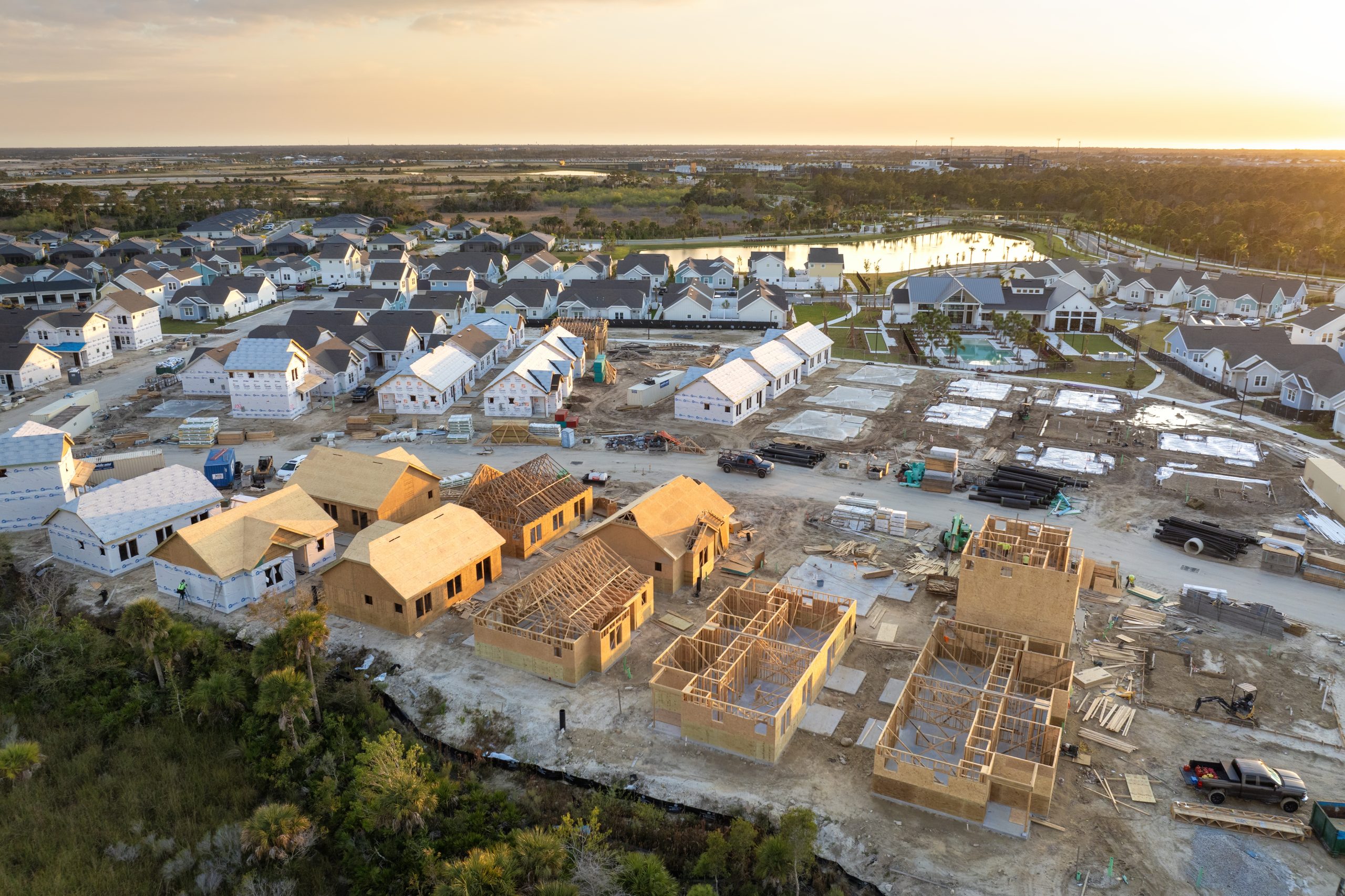 development of residential housing in the usa. wooden frames of new cheap american homes under construction